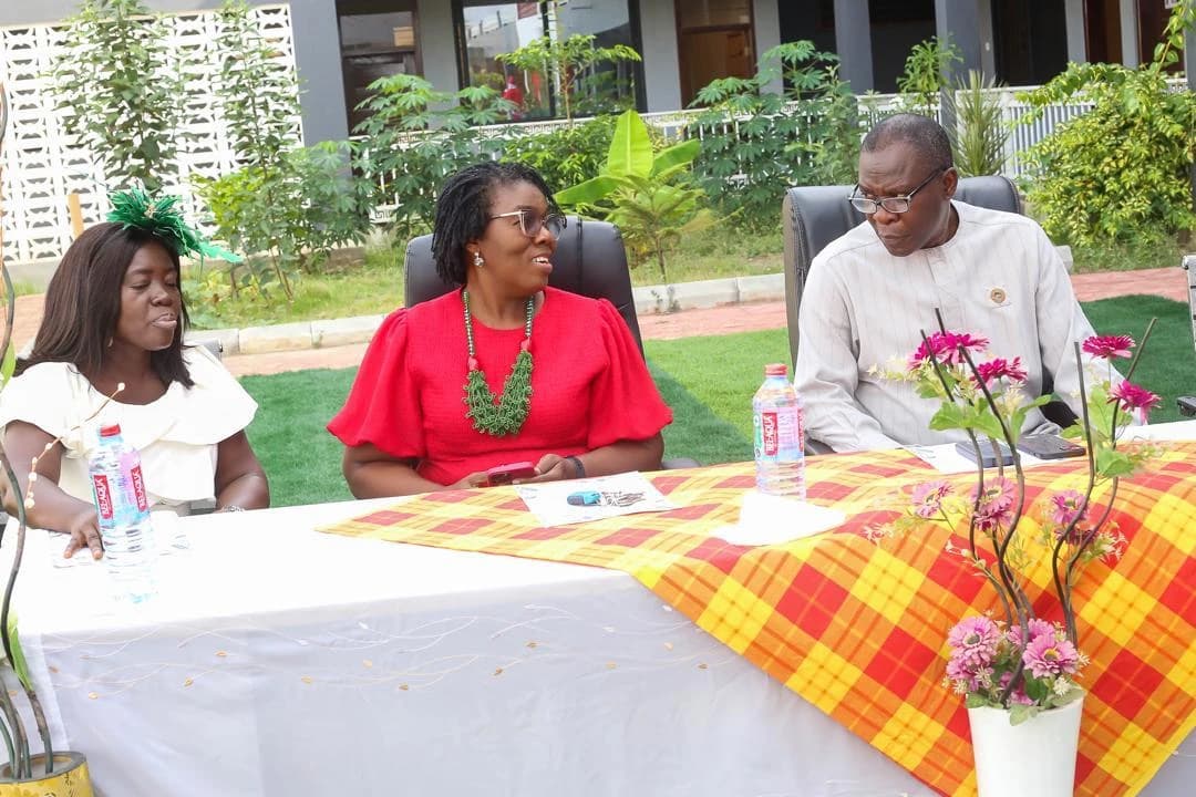 Guests seated at a decorated table during the ALLSWELL Premier School Carol Service