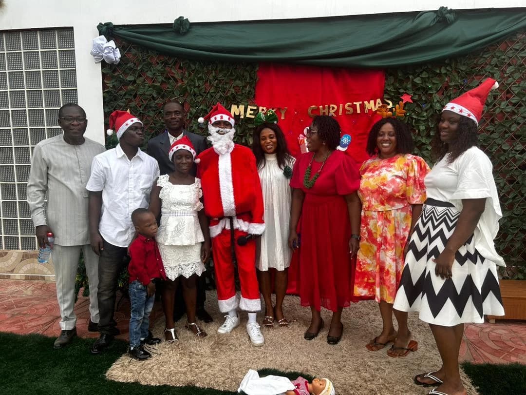 Members of the ALLSWELL Premier School leadership and community posing at the Carol Service